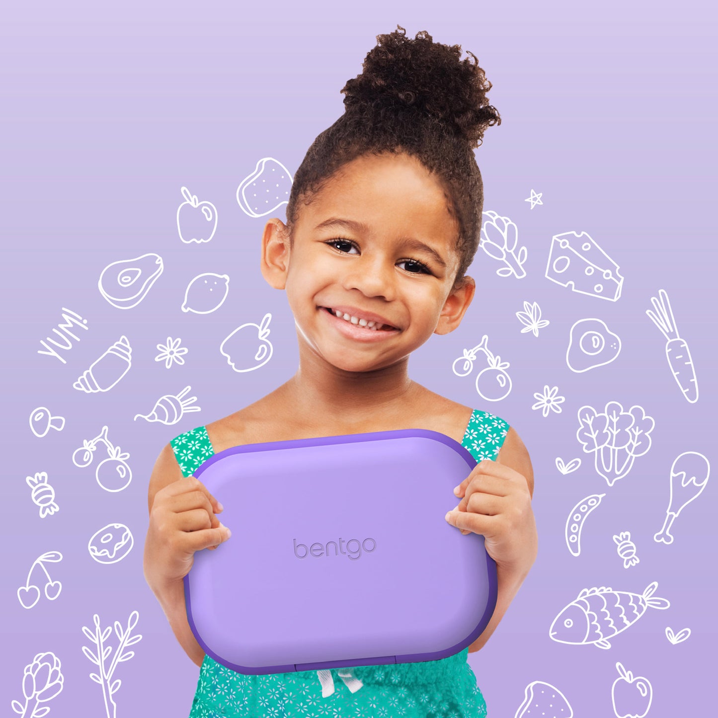 A cheerful young girl holding a purple "bentgo" lunch box with a background of playful doodles featuring various food items and the word "YUM".