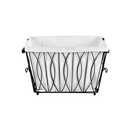 A black metal wire laundry basket with a white fabric liner and brown handles.